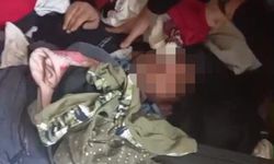 Aranan şahıs, evde bazanın altında yakalandı bahanesi ise "Başım döndü, yatıyordum" oldu