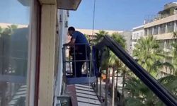 Kapıyı kilitledi, polis ekipleri vinçle camdan girerek yakaladı!
