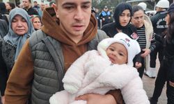 Genç polisi, 8 aylık kızı  'polis' yazan beresiyle uğurladı