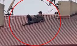 Amatör Lig maçını çatıda uzanarak izledi