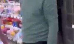 Kırtasiyede genç kızın fotoğrafını çekerken yakalandı!