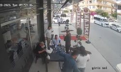 Sohbet masasına düşen davetsiz misafir kısa süreli paniğe neden oldu