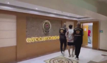 Gözaltına alınan Deniz Göktaş ters kelepçeyle emniyete götürüldü
