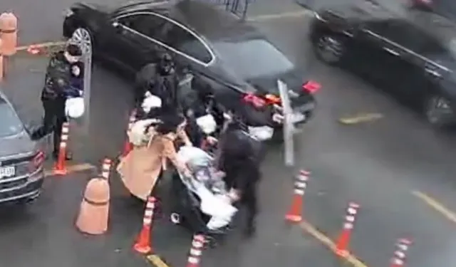 İstanbul'da polis kalkanı anne ve bebeğini fırtınadan korudu