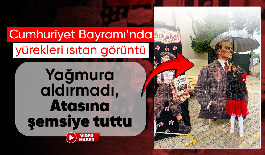 Yağmura aldırış etmeden Atasına şemsiye tutan küçük kızın davranışı yürekleri ısıttı